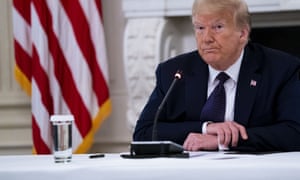 Donald Trump participates in a roundtable with law enforcement officials in the White House.