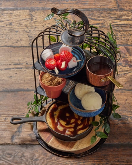 ‘We upend a veritable K2 of crumbs on to a plate’: sharing cookie dough birdcage.