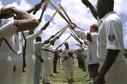 Brian Lara gets a guard of honour as he leaves the field after breaking Gary Sobers’ Test record