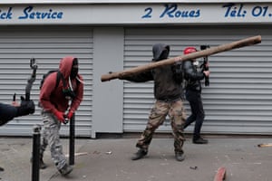 Paris, France. Protesters throw items during a demonstration against pension changes