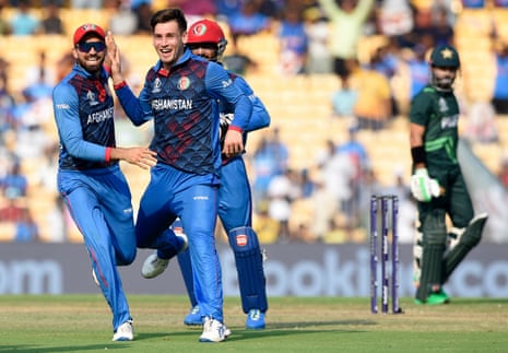 Afghanistan's Noor Ahmad celebrates the wicket of Pakistan's Mohammad Rizwan.