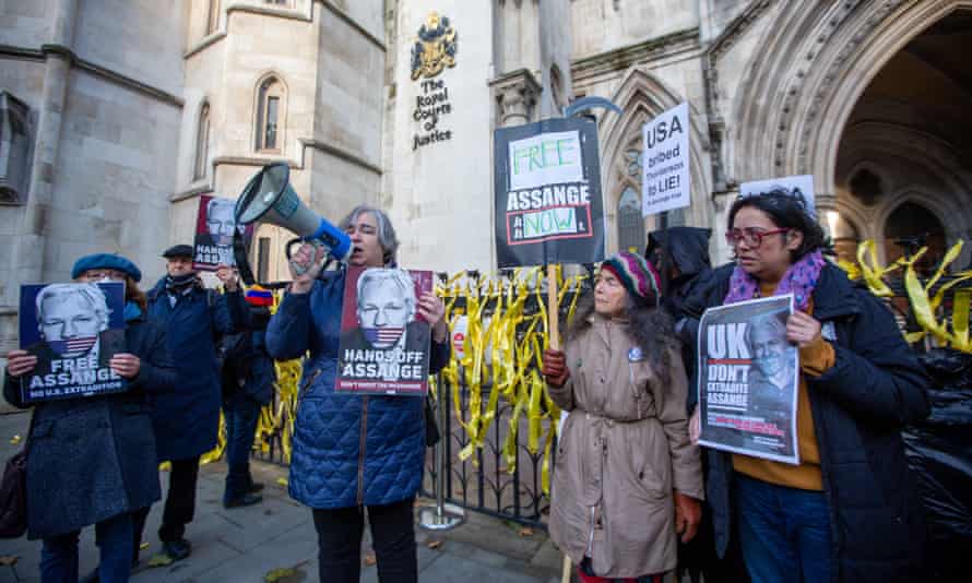 Supporters of Assange stage a protest outside the Royal Courts of Justice in London
