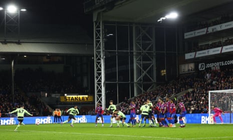 Phil Foden of Manchester City fires in a free kick that is saved by Crystal Palace’s goalkeeper Vicente Guaita.