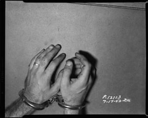 A cuffed perpetrator – 1952