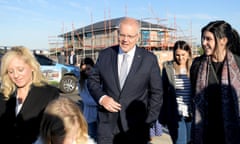 Scott Morrison with the Liberal candidate for Lindsay, Melissa McIntosh, left, and first homebuyers during a visit to a housing estate in Caddens, in the seat of Lindsay