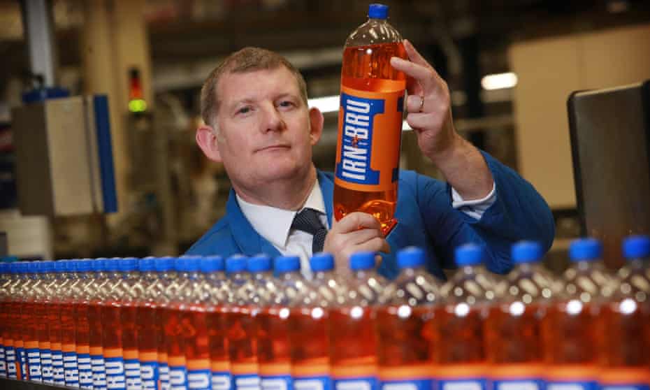 AG Barr’s chief executive, Roger White, with Irn-Bru bottles