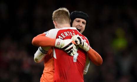 Petr Cech and Per Mertesacker hug at the end of the match.