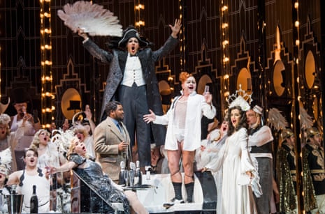 Lukhanyo Moyake as Alfredo, centre, and Claudia Boyle as Violetta, far right, in ENO’s new La Traviata.