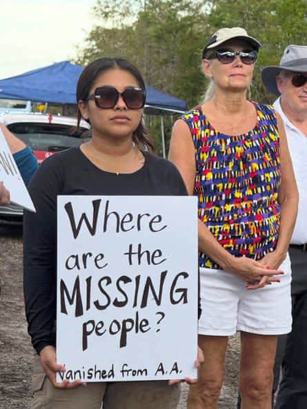 a women holding a sign