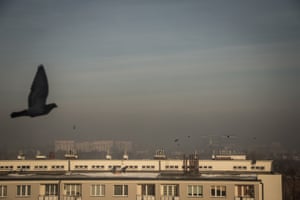 A layer of smog caused by thousands of domestic chimneys blankets high-rise buildings in Katowice