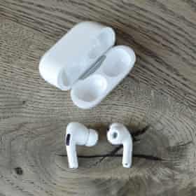 Apple AirPods Pro - earbuds out with case