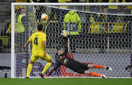 Pau Torres hits Villarreal’s 10th penalty past David de Gea of Manchester United in the Europa League final penalty shootout.