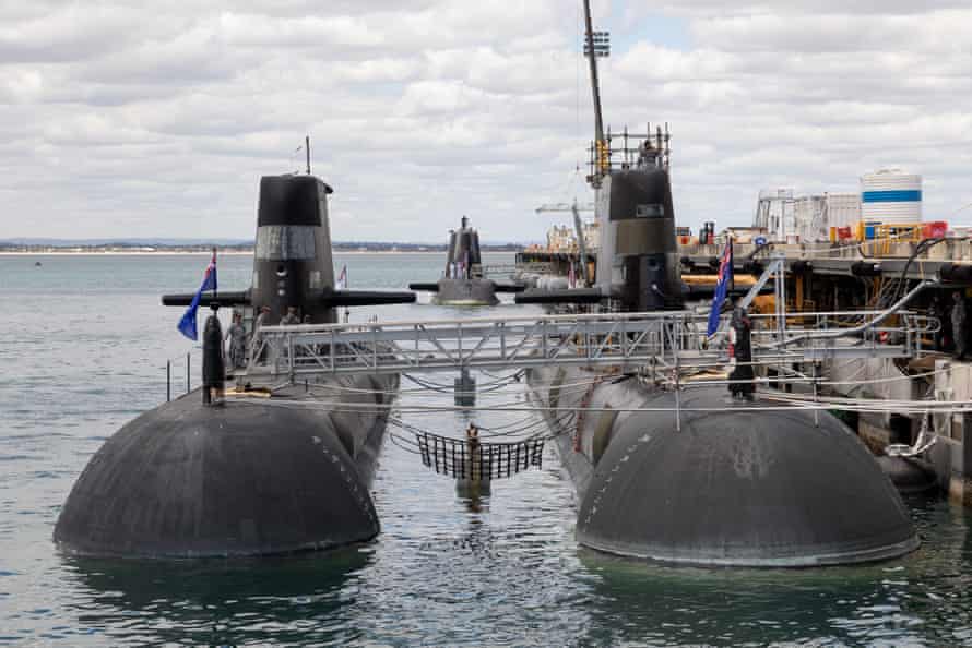 Two Australian Collins-class submarines in front of the UK’s nuclear-powered HMS Astute