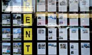 Houses for rent in a real estate agent's window