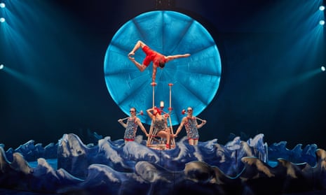 Movie glamour … handstander Ugo Laffolay as a lifeguard in Cirque du Solei’s Luzia. 