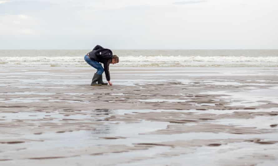 An amateur archaeologist on beach