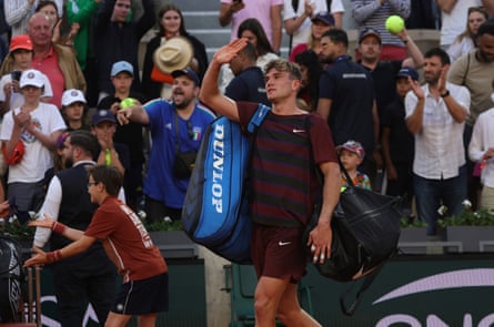 Jack Draper waves to the crowd after his defeat by Alexander Bublik
