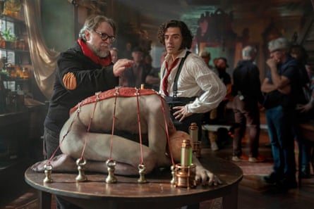 Guillermo del Toro, left, and Oscar Isaac on the set of Frankenstein