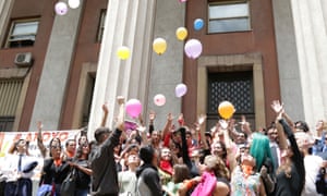 Activists celebrate outside a courthouse in Mendoza, Argentina Monday.