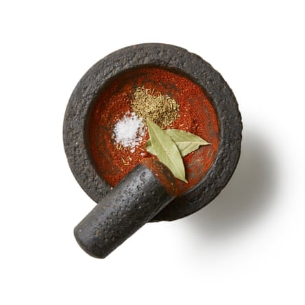 Felicity Cloake’s jambalaya– Make the spice mix: Fry the peppercorns, paprika and cayenne in a small dry pan over a high heat until you begin to smell them toasting, then tip into a mortar or spice grinder to grind the peppercorns to a fine powder. Stir in the thyme, bay and salt, then set aside.