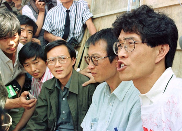 Liu Xiaobo (in blue shirt) and other pro-democracy activists during the students’ hunger strike in Tiananmen Square, 1989.