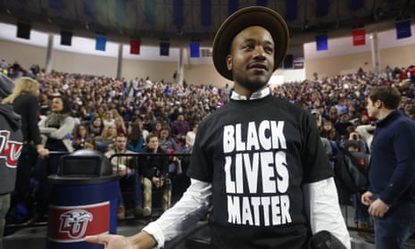 Jeff LongLiberty University student Jeff Long, of Washington DC., wears a Black Lives Matter t-shirt as he looks for a seat prior to a speech by Republican Presidential candidate Donald Trump at Liberty University in Lynchburg, Va., Monday, Jan. 18, 2016. (AP Photo/Steve Helber)
