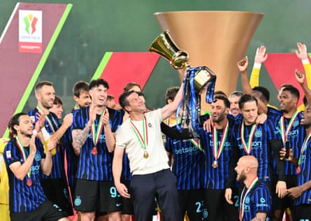 Cristian Chivu lifts the Coppa Italia trophy on Wednesday