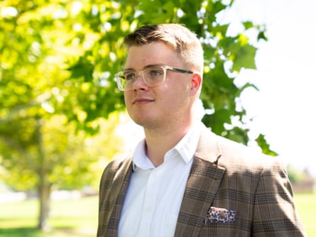 a man looking at a camera