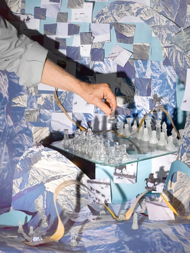 A person playing chess against a blue-and-white background