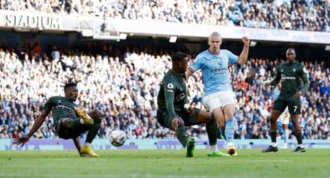 Erling Haaland, Manchester City player, scores his fourth goal.