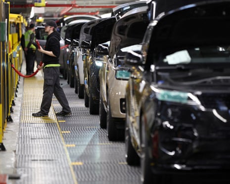 Staff on the production line at Jaguar Land Rover’s factory in Solihull, Britain