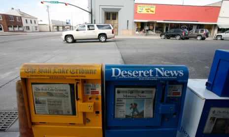 Local newspapers for sale in newspaper dispensers in the town of Salina, Utah.