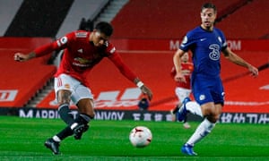Marcus Rashford tries a shot against Chelsea