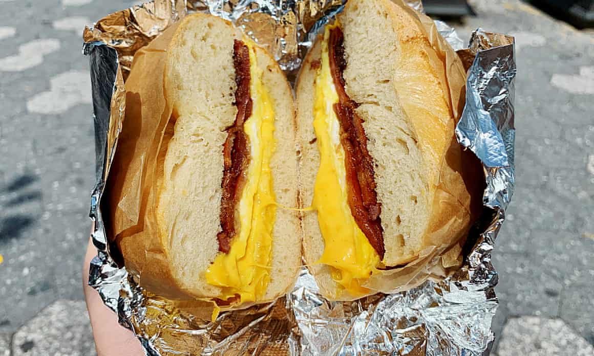 A bacon, egg, and cheese bagel wrapped in tin foil