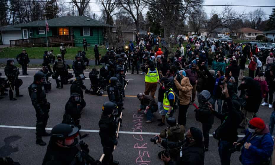 Protesters face off with police in Brooklyn Center, Minnesota.