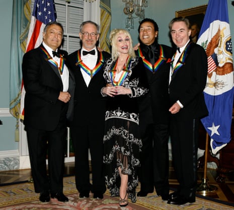 (from left) Zubin Mehta, Steven Spielberg, Dolly Parton, Smokey Robinson and Andrew Lloyd Webber stand with medallions on rainbow ribbons around their necks