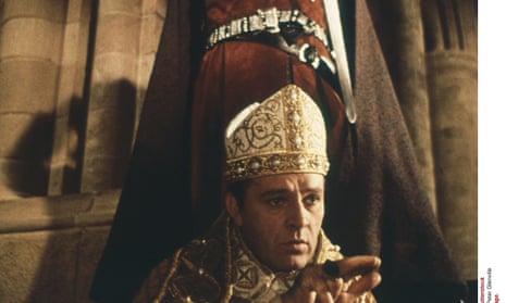 Richard Burton as Thomas Becket, Archbishop of Canterbury, about to be martyred at his cathedral, December 1170, in the 1964 film of the saint’s life and his death by sword. A tunic widely held to be that of the saint, worn when he was assassinated, is set to return to Canterbury from Rome after more than five centuries.