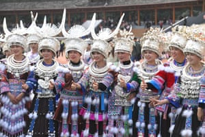 People in traditional costumes participate in the Lusheng folk musical festival, Rongshui, China