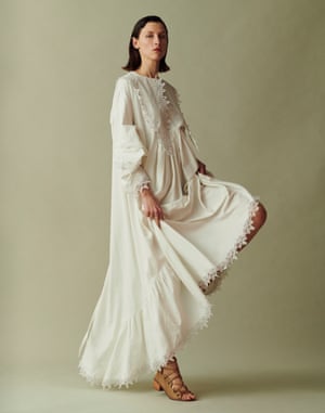 Dress by Loewe. Sandals by Stella McCartney