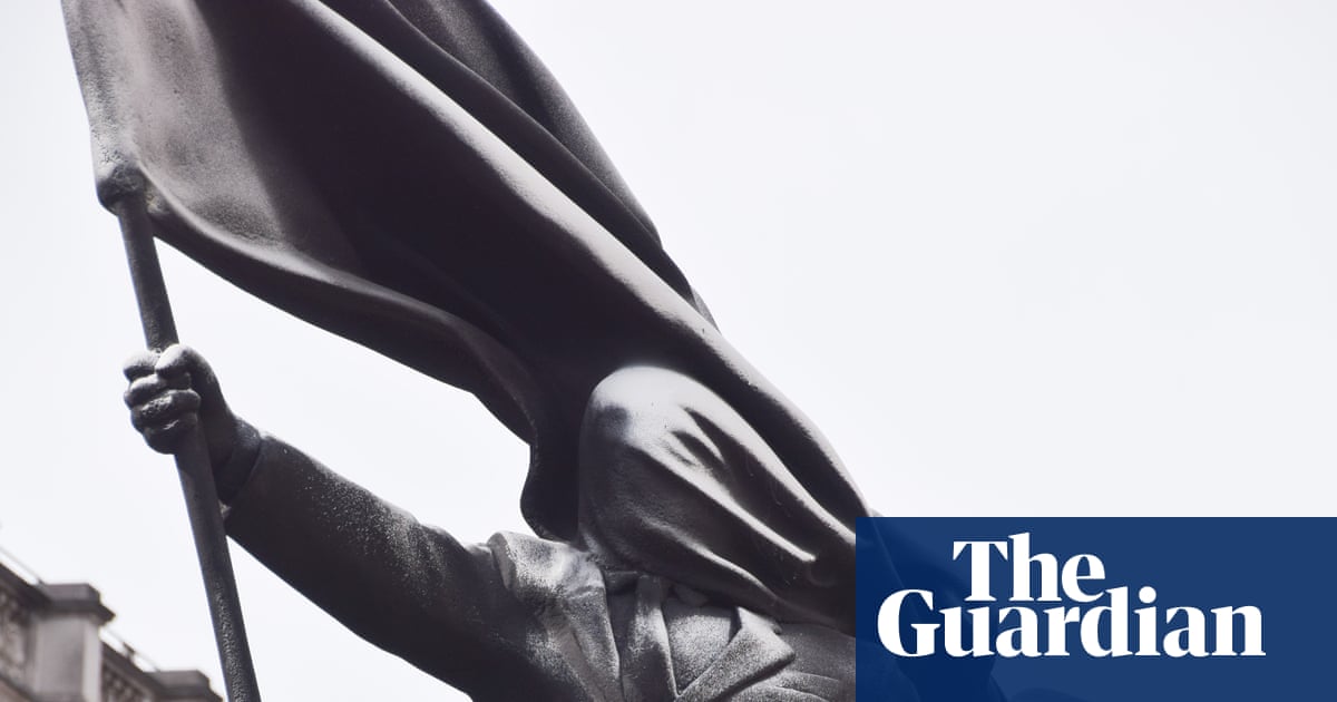 Banksy confirms statue of man blinded by flag that appeared in London is by him Banksy confirms statue of man blinded by flag that appeared in London is by him