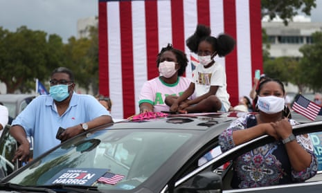 Voters listening to Obama at the drive-in rally in North Miami today.