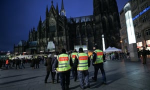 Security guards and extra police patrol the central square in Cologne a year on from the mass sexual assaults on women in the western German city.