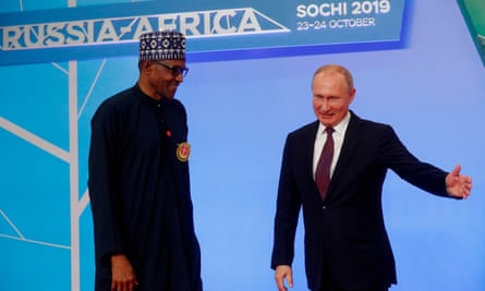 Russia’s president, Vladimir Putin, greets Nigeria’s president, Muhammadu Buhari, at the 2019 Russia-Africa summit in Sochi.