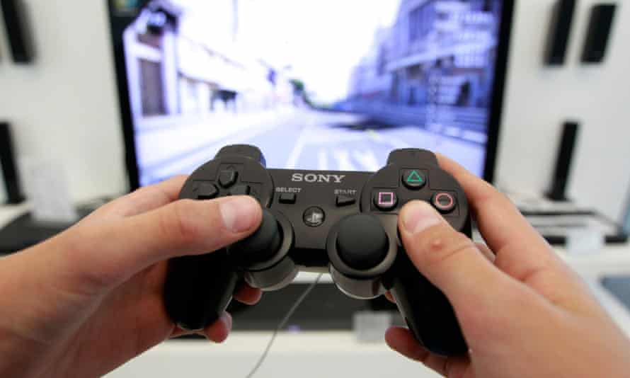 Person plays Playstation