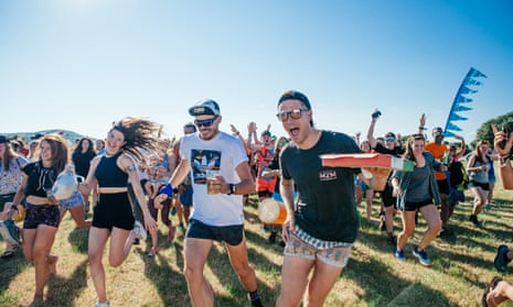 Revellers at 2019's Love Trails festival in Wales , which offers guided trail runs on the coast and in woodland, plus live music.