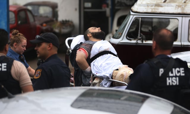 Ahmad Khan Rahami is taken into custody after a shootout with police on Monday in Linden, New Jersey.