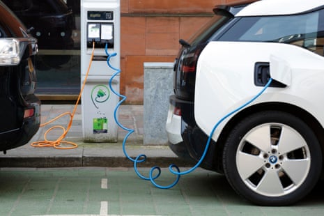 Two electric cars charging in Glasgow.