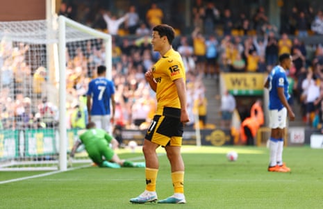 Hwang Hee-Chan of Wolverhampton Wanderers celebrates after scoring his team's first goal during the Premier League match between Wolverhampton Wanderers and Everton at Molineux.