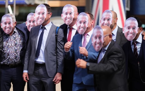 Racegoers in comical face masks during day one of Royal Ascot.