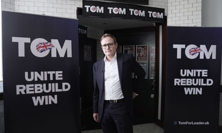 Tom Tugendhat with his campaign slogan, 'Tom: unite, rebuild, win' at Chatham Town Football Club in Kent.